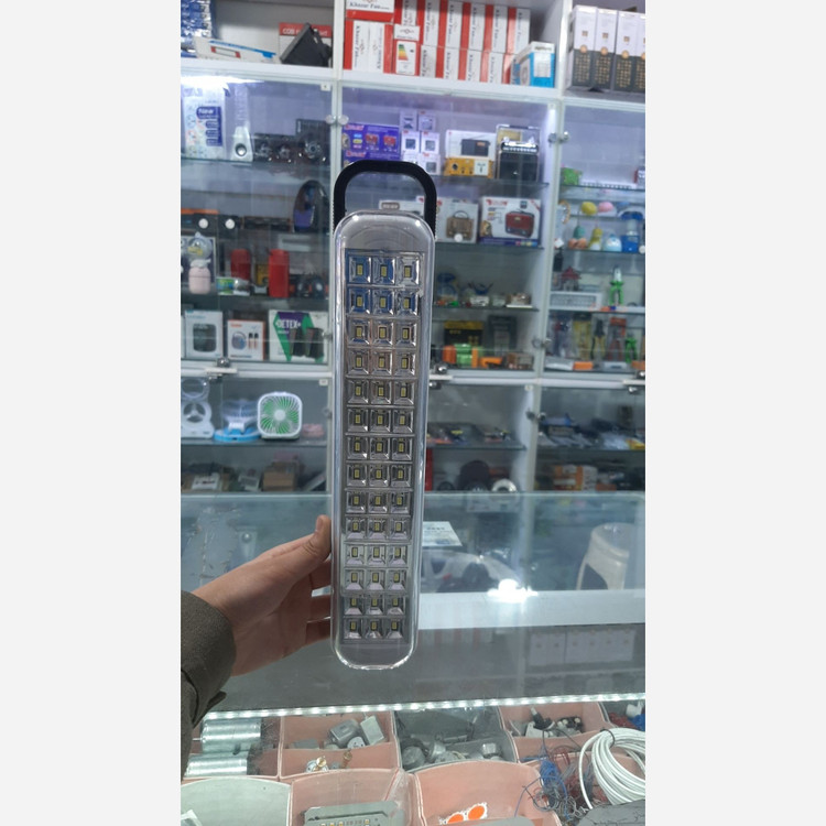 چراغ اضطراری شارژی HG DUE مدل HG-714 اصلی با 42 SMD قابل حمل با نوردهی بیش از 5 ساعت مناسب زمان قطعی برق و کمپینگ